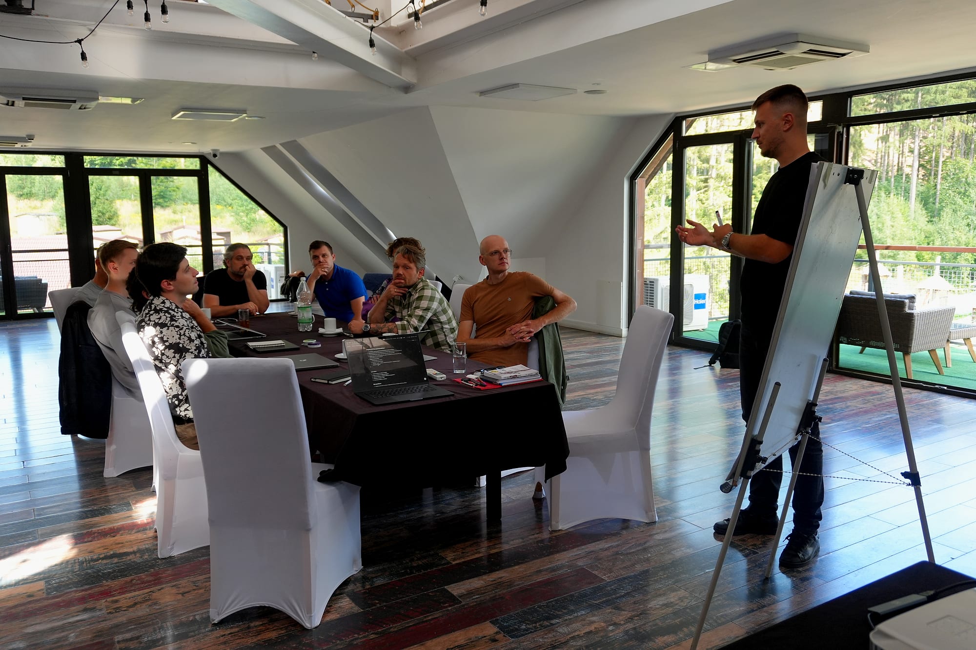 A Vstorm strategy session around one table