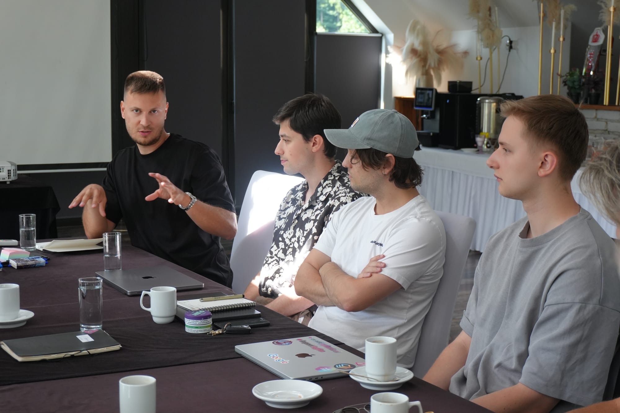 A strategy session around a long table